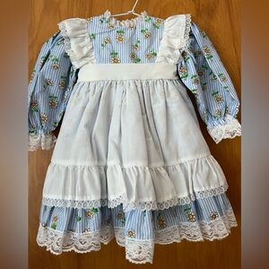 Brand new Mini World Doll Dress with lace and ruffles